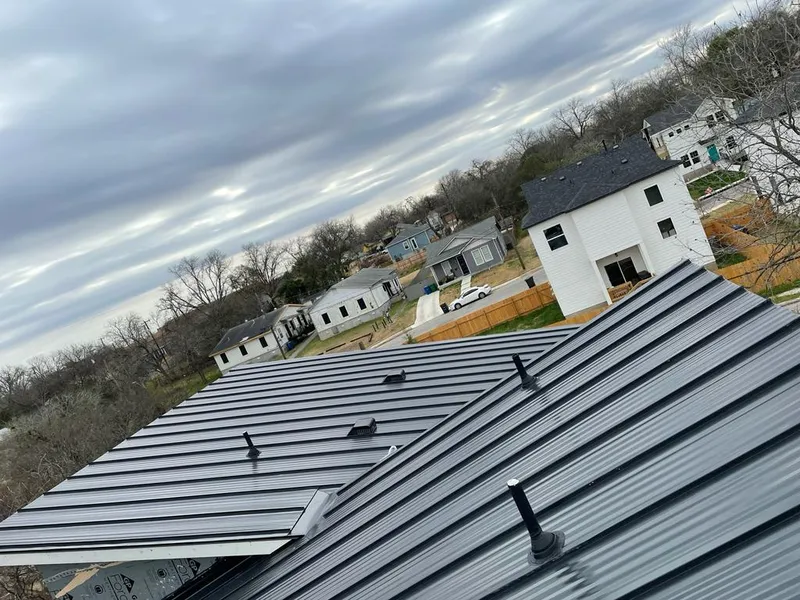 Standing seam metal roof panels with vents for Skylight Repair in Hutchinson